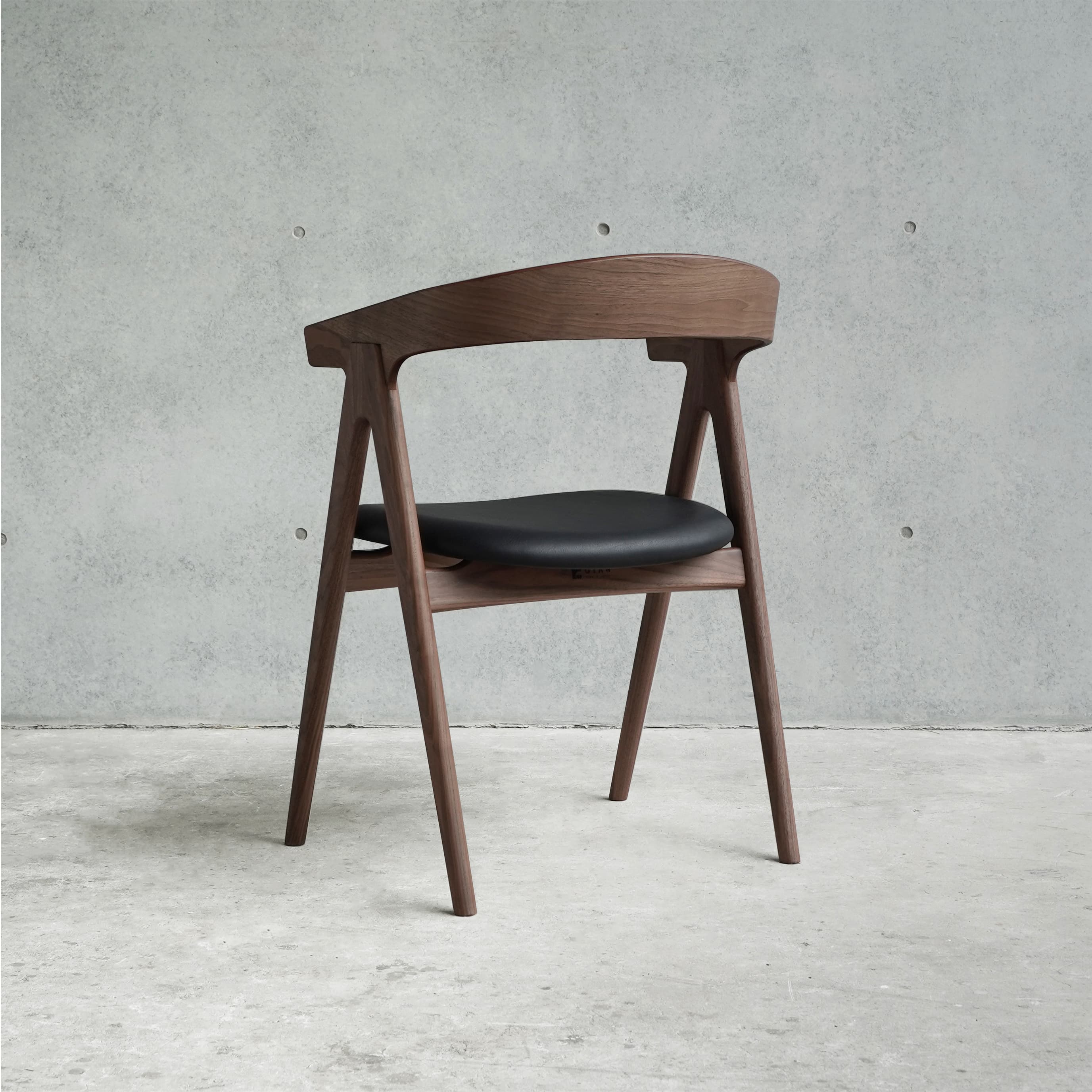 A modern armchair with a curved wooden frame and a black upholstered seat. The chair has four angled legs, a curved backrest that extends into armrests, and a distinctively shaped seat. — 3D model