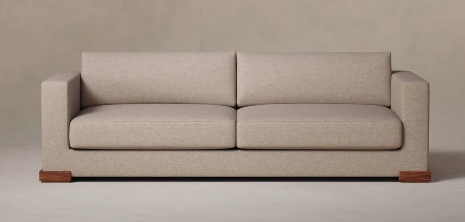 A two-seater sofa upholstered in light beige fabric, featuring straight, boxy track arms, two distinct seat cushions, two matching back cushions, and low rectangular wooden block feet. — 3D model
