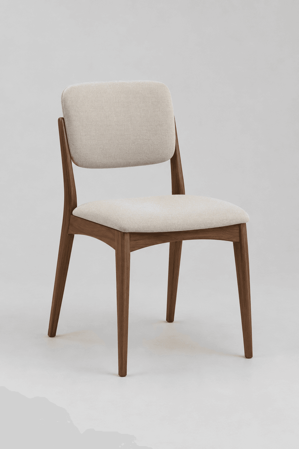 A contemporary armless chair featuring a dark walnut wood frame with tapered legs and a gently curved backrest, upholstered in light beige fabric. — 3D model
