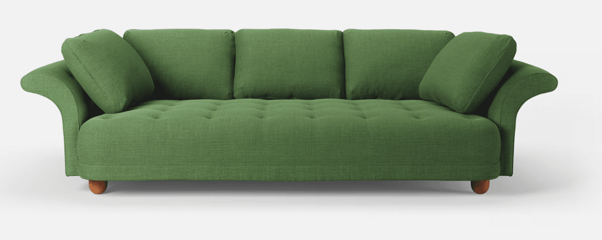 A three-seater sofa with a tufted seat and back cushions. It features rolled arms that curve outwards and short wooden legs. The sofa is upholstered in a textured green fabric and comes with two matching throw pillows. The back cushions are loose, while the seat appears to be a single tufted cushion. — 3D model
