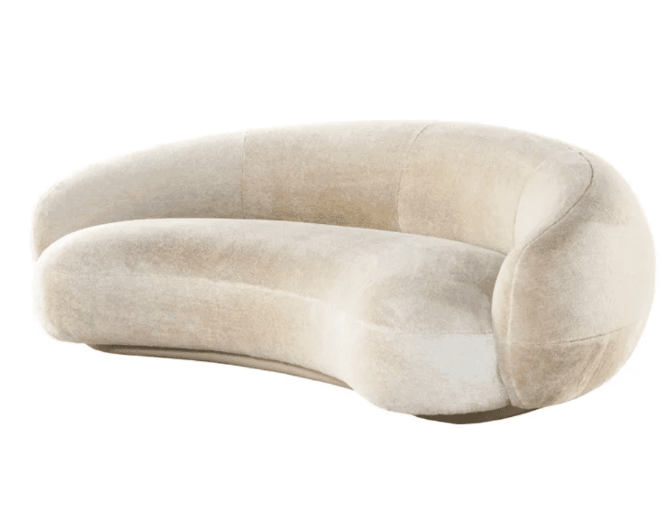 A contemporary curved sofa upholstered in a light, off-white boucle fabric, featuring a seamless design and a recessed base. — 3D model