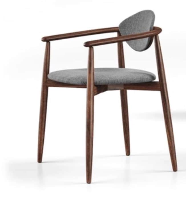 A modern armchair with a curved backrest and armrests, featuring a wooden frame and upholstered seat… — 3D model