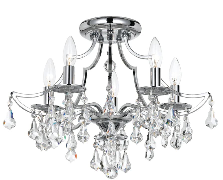 A flush-mount chandelier with a chrome-finished metal frame and multiple crystal prisms. It features five candle-style bulbs and decorative hanging crystal elements. The design combines classic chandelier aesthetics with a semi-flush mount configuration suitable for lower ceilings. — 3D model