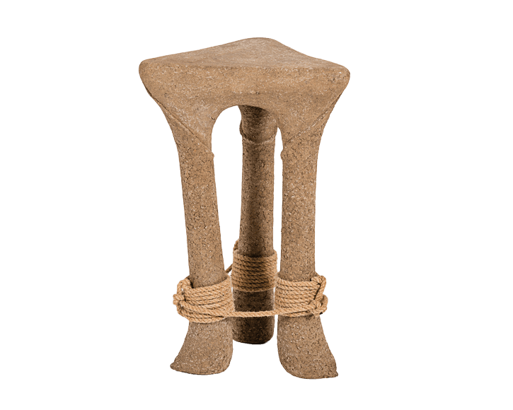 A unique, three-legged stool with a triangular top. The legs are curved and tapered, with a rough, textured finish. They are joined together in the lower section by two thick, twisted ropes. The overall aesthetic suggests a rustic or possibly artistic piece. — 3D model