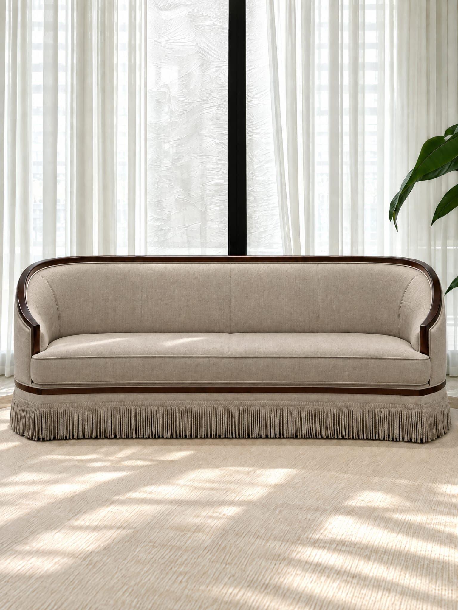 A traditional barrel back sofa featuring a continuous curved back and arms, an exposed dark wood frame, light neutral fabric upholstery, a single seat cushion, and a decorative fringe skirt. — 3D model