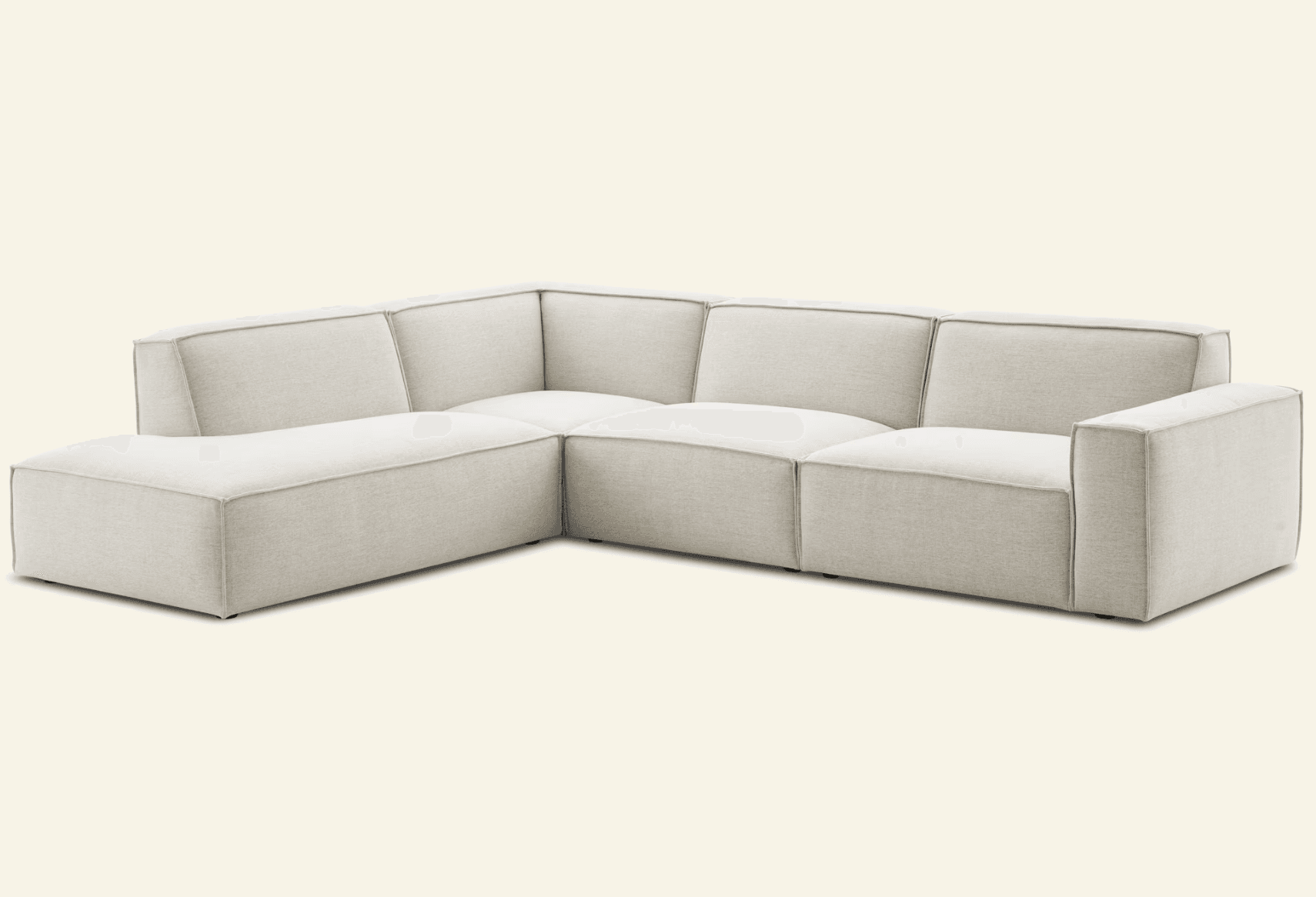 An L-shaped modular sectional sofa upholstered in a light-colored fabric, featuring a clean, contemporary design with piping detail along the edges of the cushions and frame. — 3D model