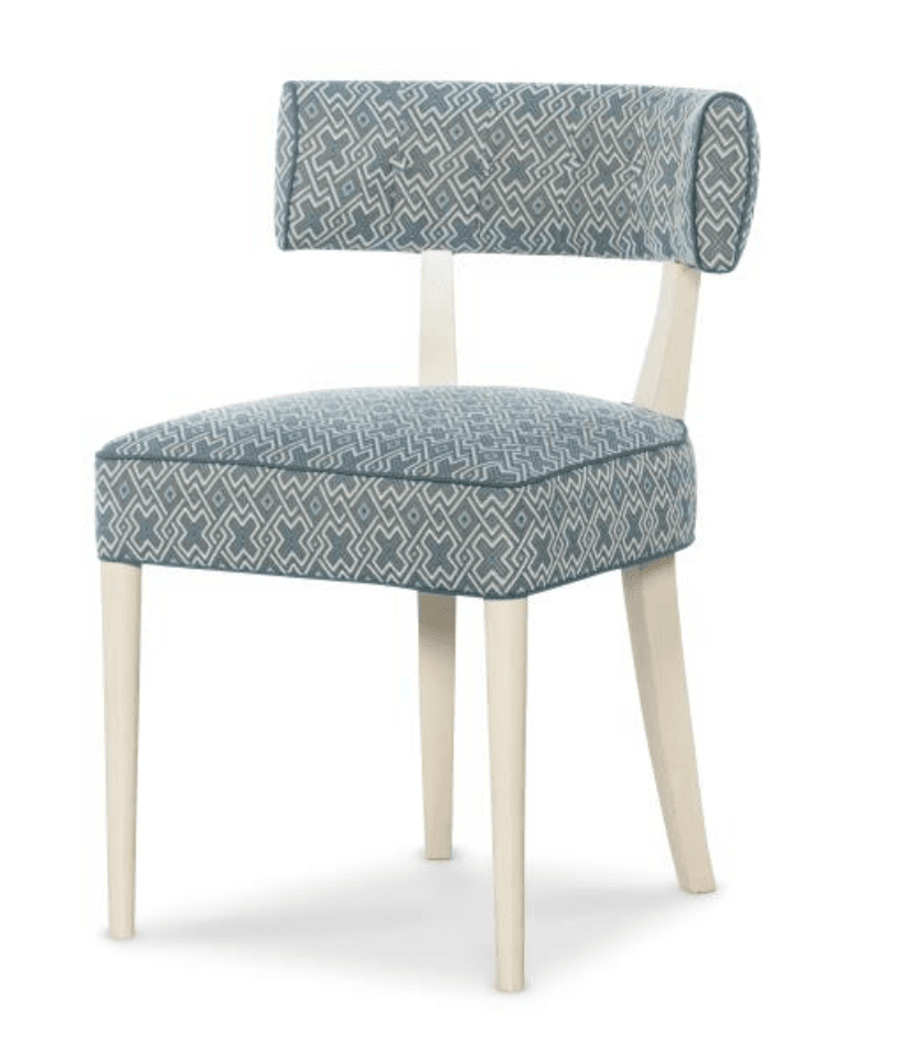 A upholstered armchair with a geometric pattern fabric on the seat and backrest. The frame and legs are made of wood and are painted a light cream color. The backrest has a slight curve and is supported by two wooden uprights. The seat is square-shaped and padded. — 3D model