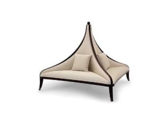 An elegant double-sided loveseat featuring a unique tall, arched canopy frame crafted from dark wood, upholstered in a light cream fabric. It includes two matching throw pillows and rests on four tapered, splayed legs. — 3D model