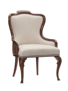 An upholstered accent chair with a carved wooden frame. The chair features a high, curved backrest, upholstered in a textured light-colored fabric. The seat is also upholstered. The wooden frame has an ornate, possibly carved, finish and curved legs. Decorative nailhead trim is visible along the seat and backrest base. The armrests are partially visible and appear to be upholstered with a woven texture on the sides. — 3D model