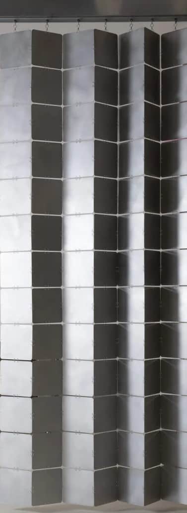 A room divider composed of multiple square, metallic panels arranged in a flexible, accordion-like s… — 3D model