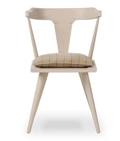 A light-toned wooden dining chair featuring a modern Scandinavian design. It has a curved top rail b… — 3D model