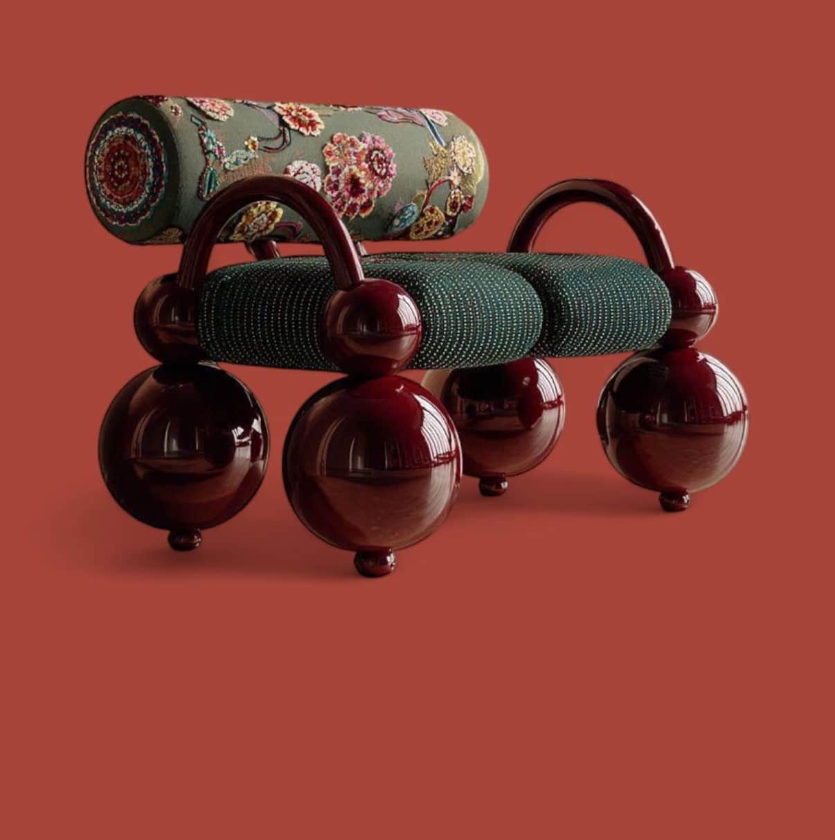 A whimsical sculptural two-seater bench featuring a glossy burgundy lacquered frame and legs, contra… — free OBJ 3D model