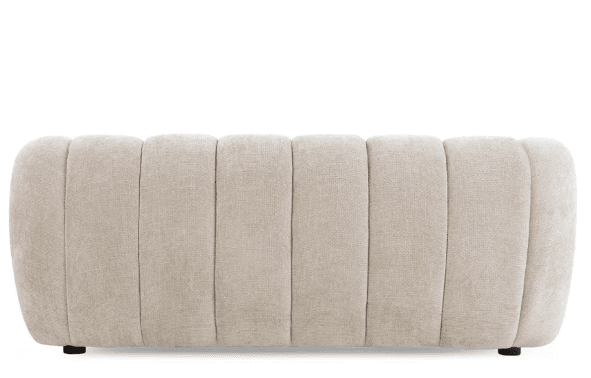 A long, rectangular upholstered ottoman featuring vertical channel tufting across its entire surface. The piece has soft, rounded ends and is covered in a light, neutral-toned fabric, possibly a linen or boucle. It rests on very low-profile, inconspicuous feet. — 3D model
