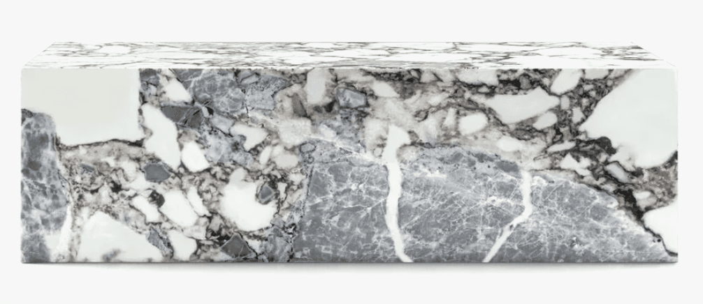 A rectangular block-shaped coffee table constructed from a composite of variegated marble, featuring distinct patterns of white, gray, and black. — 3D model