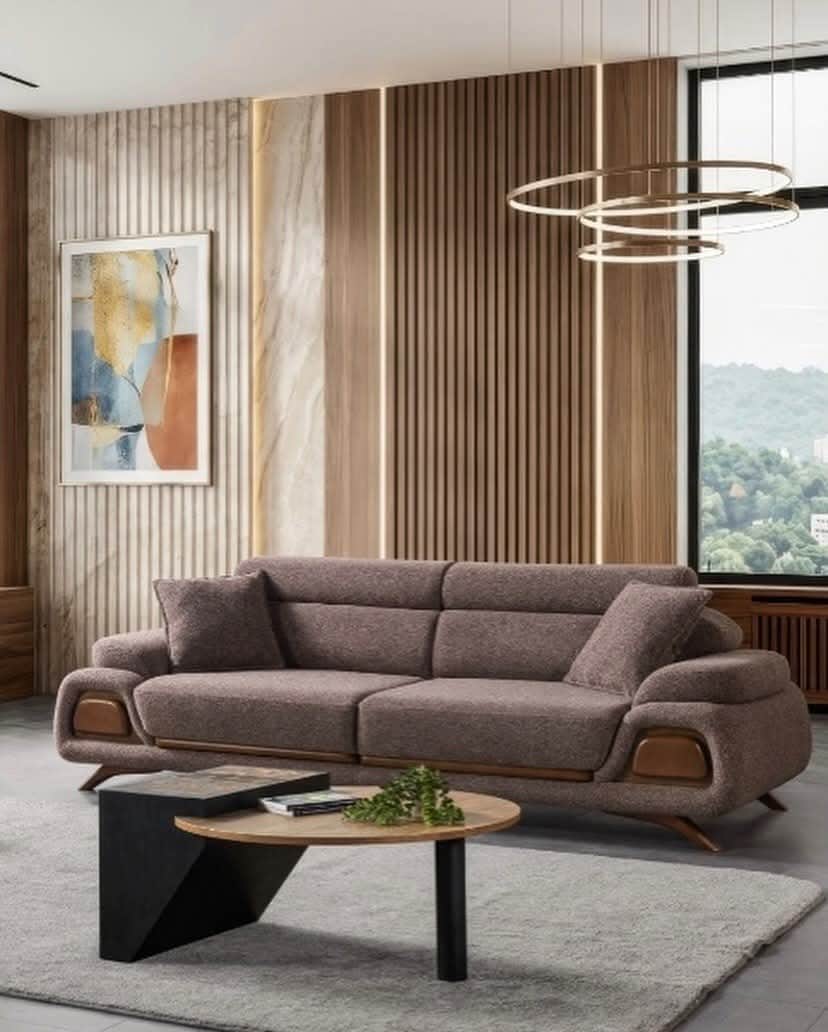 A contemporary three-seater sofa upholstered in a textured brown fabric, featuring distinctively cur… — 3D model