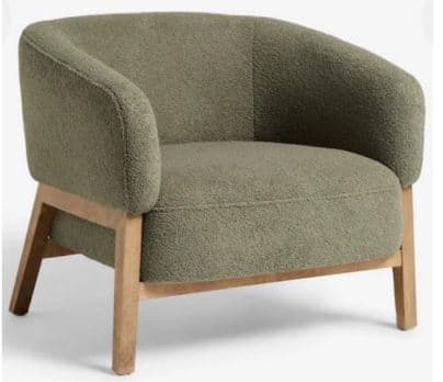 A modern armchair featuring a rounded, fully upholstered seat and back in olive green boucle fabric, supported by an exposed light-toned wooden frame. — 3D model
