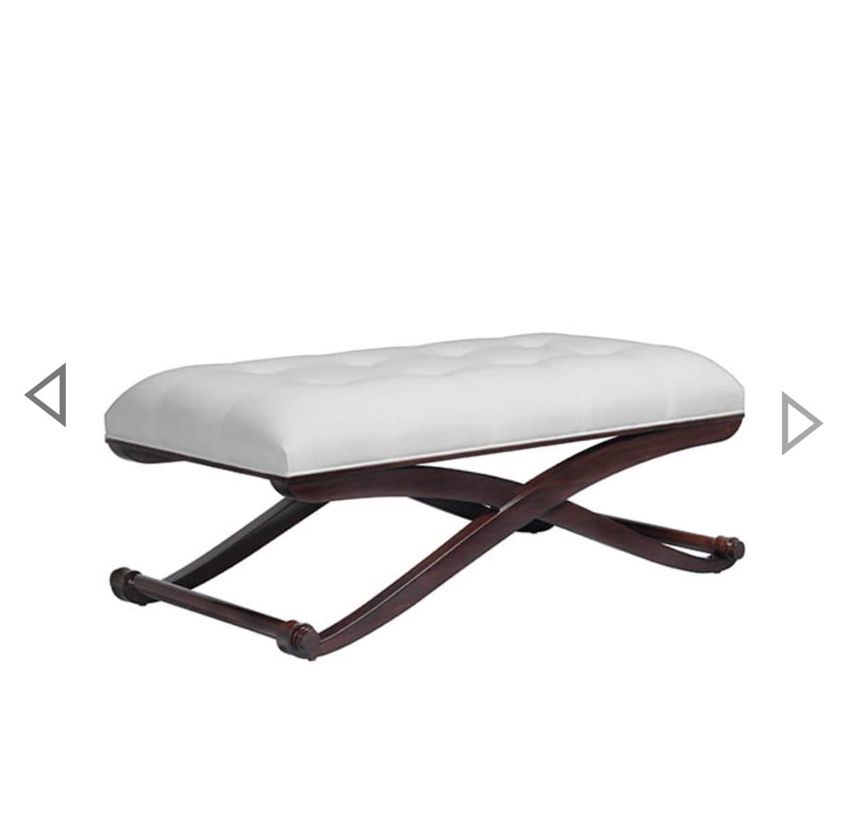 A rectangular, upholstered ottoman bench featuring a tufted white cushion and a dark brown, X-shaped… — 3D model