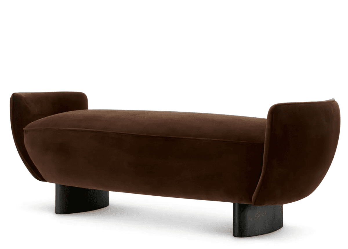 A contemporary bench upholstered in rich brown velvet, featuring a long, subtly curved seat and dist… — 3D model