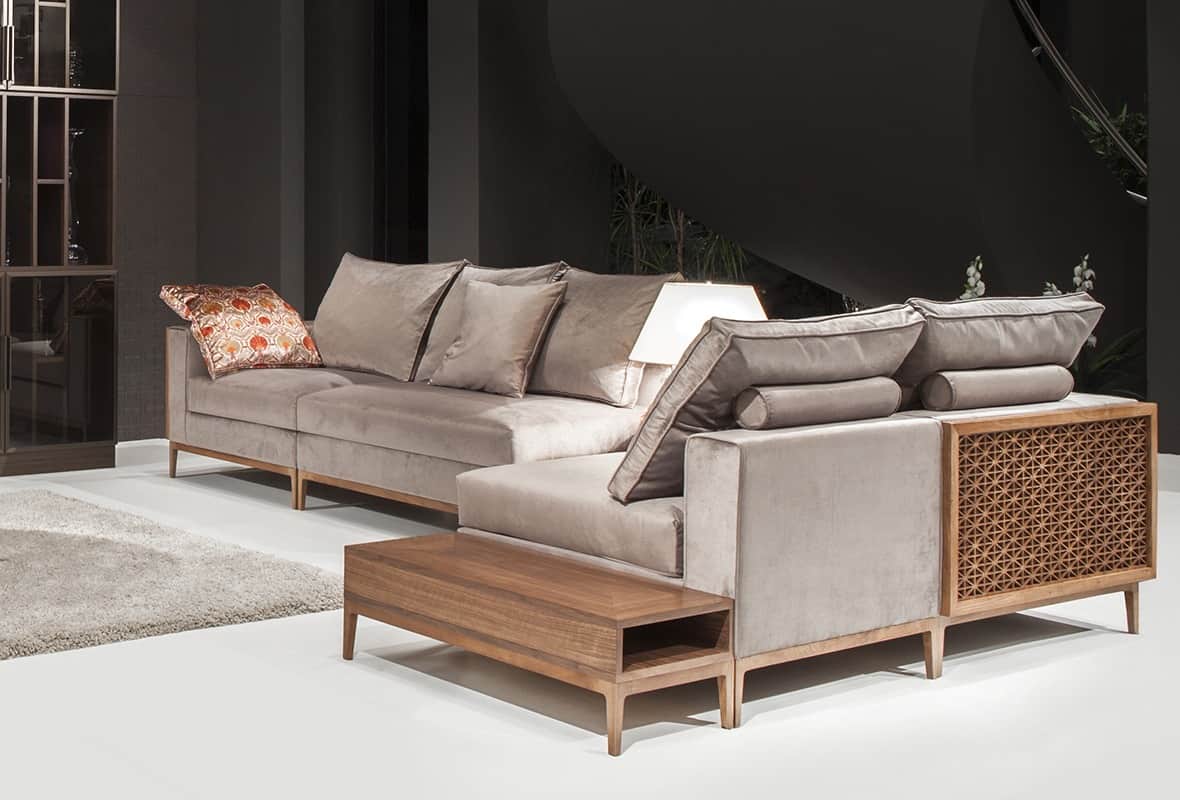 A modular sectional sofa with upholstered cushions and a decorative wooden side panel. The sofa has… — free OBJ 3D model