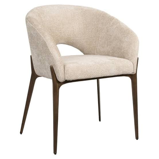An upholstered armchair featuring a curved barrel-style back and seat, supported by four slender, splayed dark wood legs. — 3D model