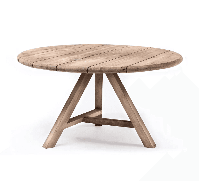 A rustic round dining table crafted from weathered wood, featuring a plank top and a sturdy A-frame leg base. The wood has a natural, light brown tone with visible grain and texture. — 3D model