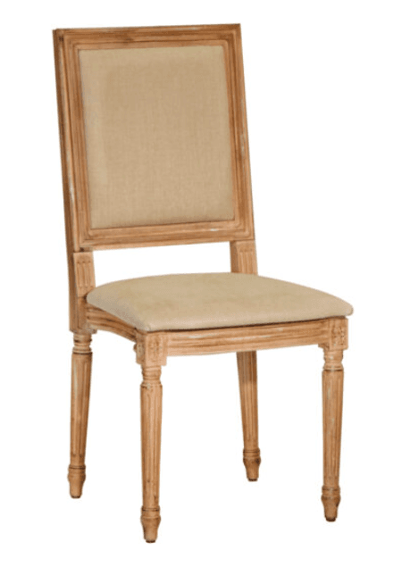 An armless chair featuring a distressed light wood frame and upholstered seat and back in a neutral beige fabric. The wooden frame has traditional carved details, including fluted legs and rosette accents, giving it a classic French Country aesthetic. — 3D model