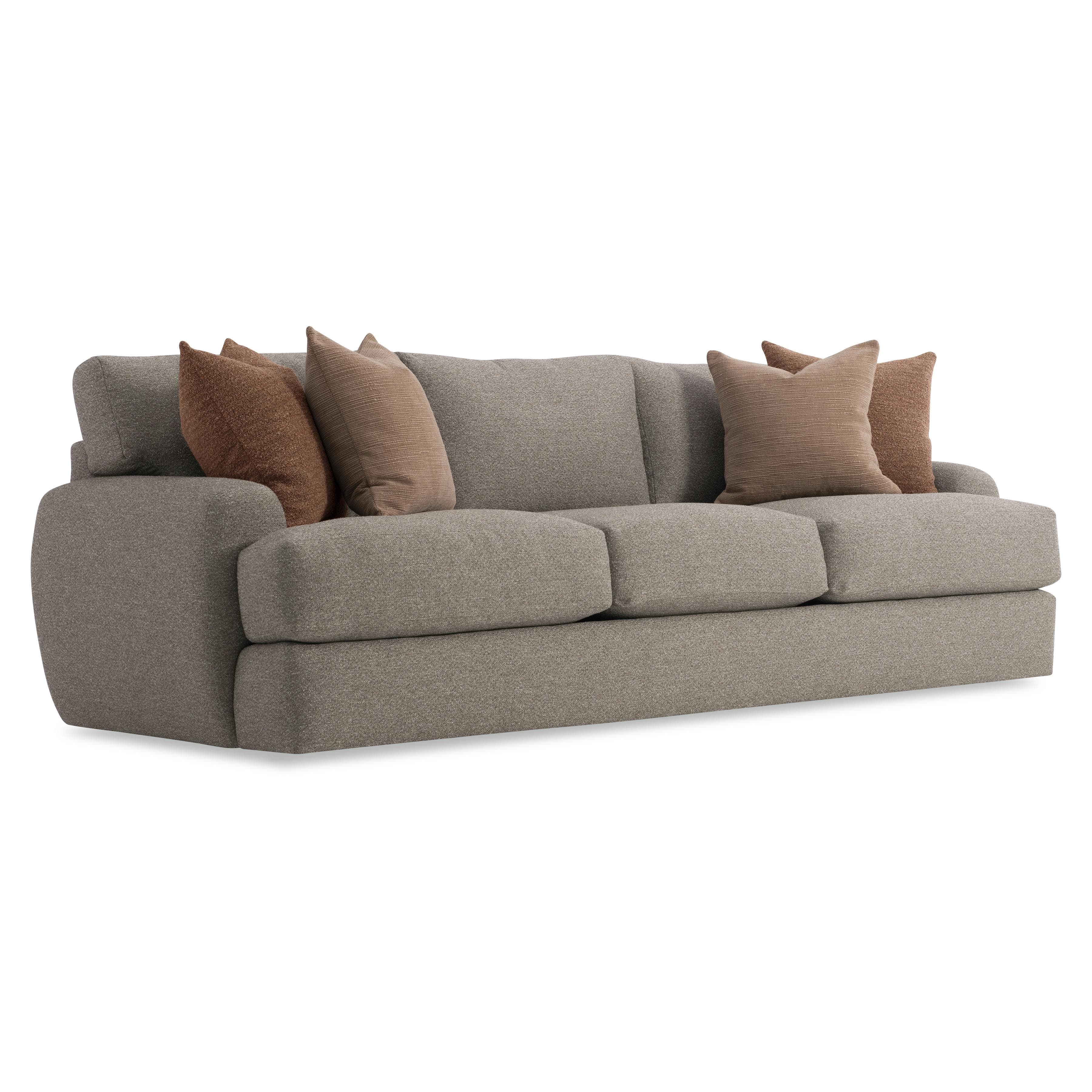 A three-seater sofa with plush cushions and a textured fabric upholstery. It features a low profile base and substantial armrests. The sofa is accessorized with four throw pillows, two in a complementary textured fabric and two in a darker, solid-colored fabric. — 3D model