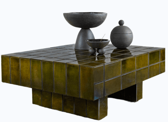 A square coffee table with a segmented base, fully clad in square, glossy, olive-green tiles. The tiles exhibit variations in color and reflectivity, creating a mosaic-like appearance. The table has a low profile and a blocky, geometric design. — 3D model