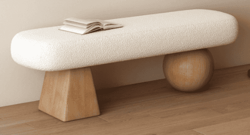 A contemporary bench featuring an elongated, rounded, upholstered seat supported by an asymmetrical… — 3D model