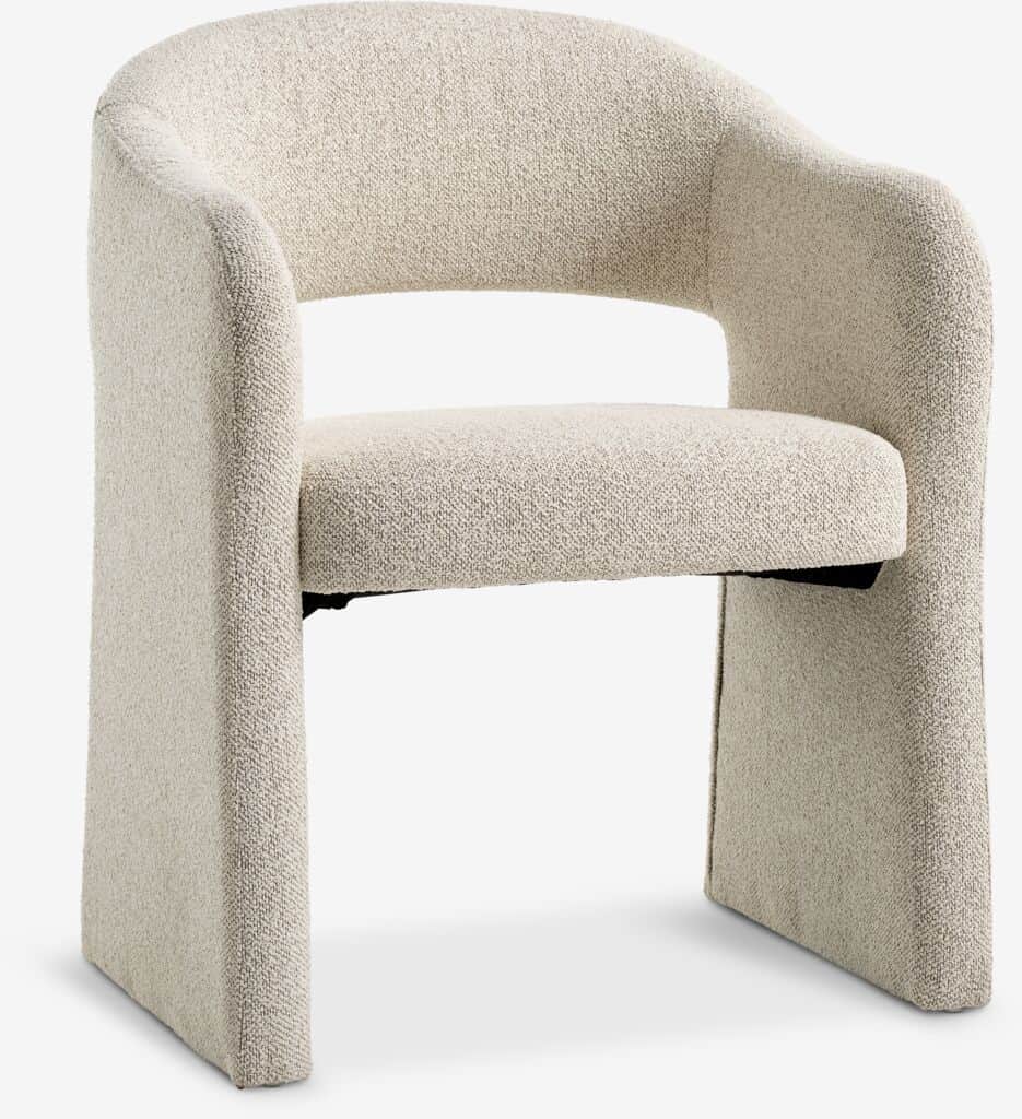 A contemporary upholstered accent chair featuring a continuous curved back and integrated armrests,… — 3D model