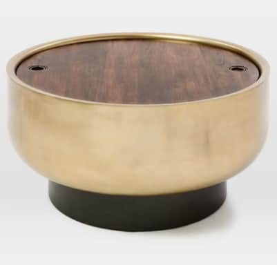 A round coffee table with a wood-grain effect tabletop and a brushed brass-finished cylindrical body… — 3D model