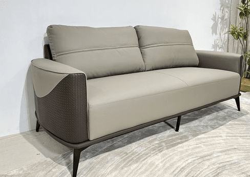 A contemporary two-seater loveseat featuring light beige upholstered cushions and seat, contrasted by dark brown woven side and back panels. The sofa has a streamlined profile with straight armrests and rests on slender, dark-finished metal legs. — 3D model