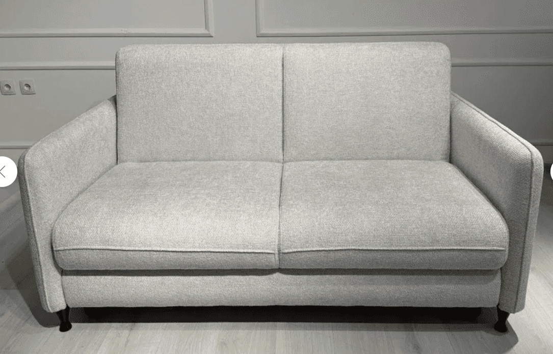 A modern two-seater sofa, also known as a loveseat, upholstered in a light gray textured fabric, fea… — 3D model