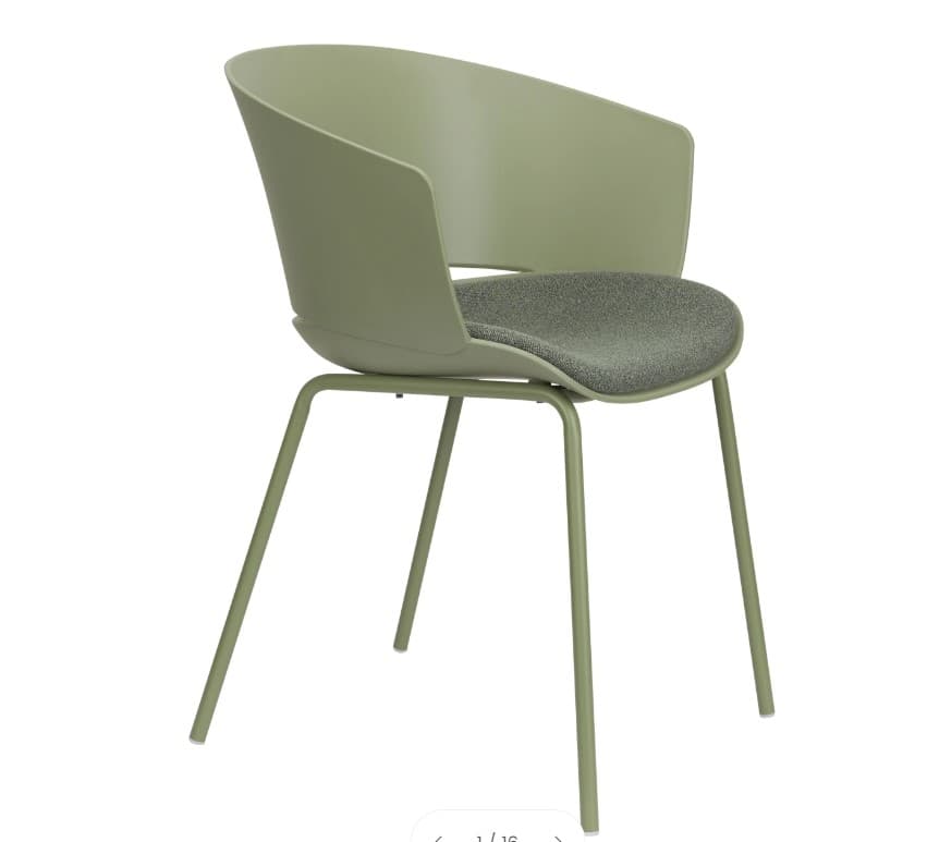 A modern armchair with a curved shell-like seat and backrest, supported by slim metal legs. The seat features a cushioned insert for enhanced comfort. The design is contemporary and minimalist, suitable for various interior settings. — 3D model