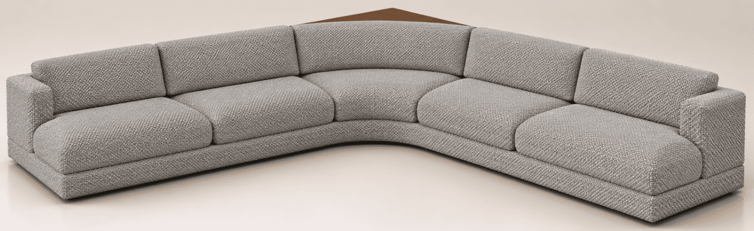 A modern, gray fabric sectional sofa featuring a distinct curved corner section. The sofa is upholstered in a textured, light gray fabric and has a low profile with wide, block-style arms. It appears to be modular, composed of several individual pieces that create an L-shaped arrangement. A small wooden surface is visible behind the curved corner. — 3D model