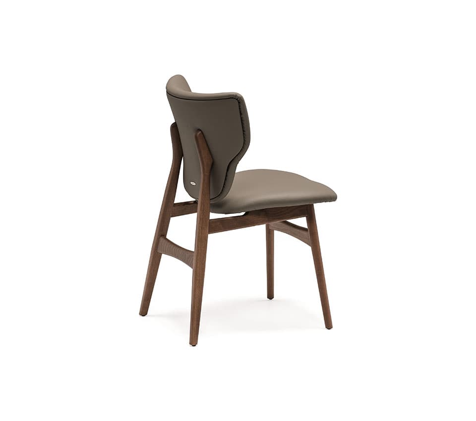 A modern dining chair with a solid wood frame and a upholstered seat and backrest. The backrest has a unique, slightly curved shape that contours to the user's back. The frame is constructed from dark wood, possibly walnut or a similar hardwood, with a natural finish. The upholstery appears to be leather or a high-quality faux leather in a neutral taupe color. The chair has a sleek, minimalist design with visible stitching on the upholstery. — 3D model