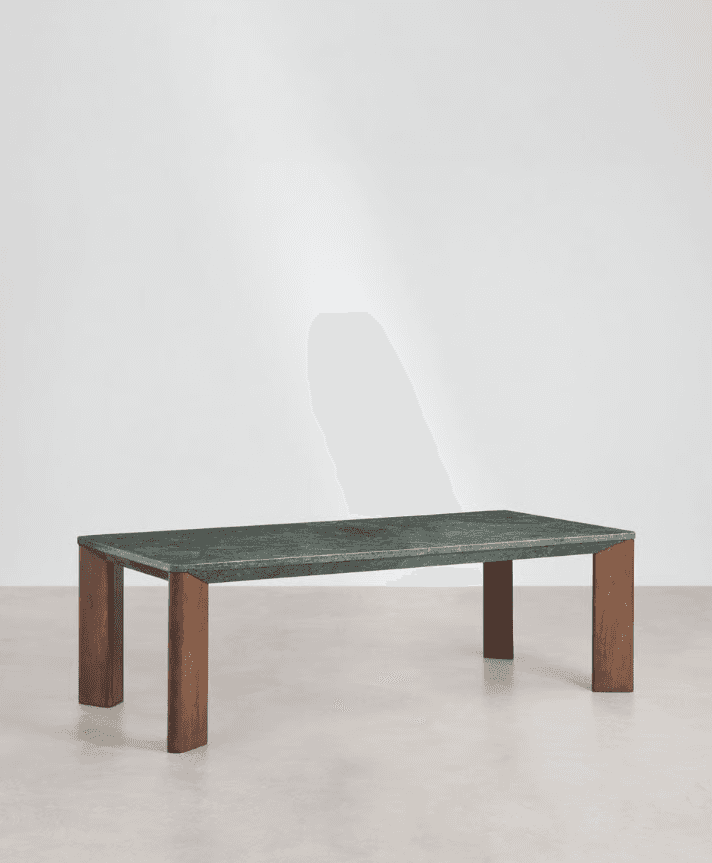 A modern dining table with a rectangular top made of green veined marble and four rectangular wooden… — 3D model