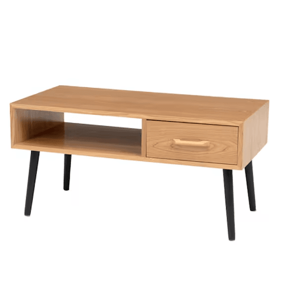 A rectangular coffee table featuring a light-toned wooden finish, equipped with an open storage compartment on one side and a single pull-out drawer on the other. It stands on four slender, splayed black tapered legs. — 3D model