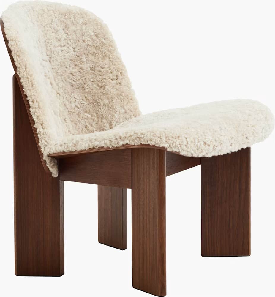 A low-slung, contemporary lounge chair featuring a sturdy dark wood frame and plush, cream-colored s… — 3D model