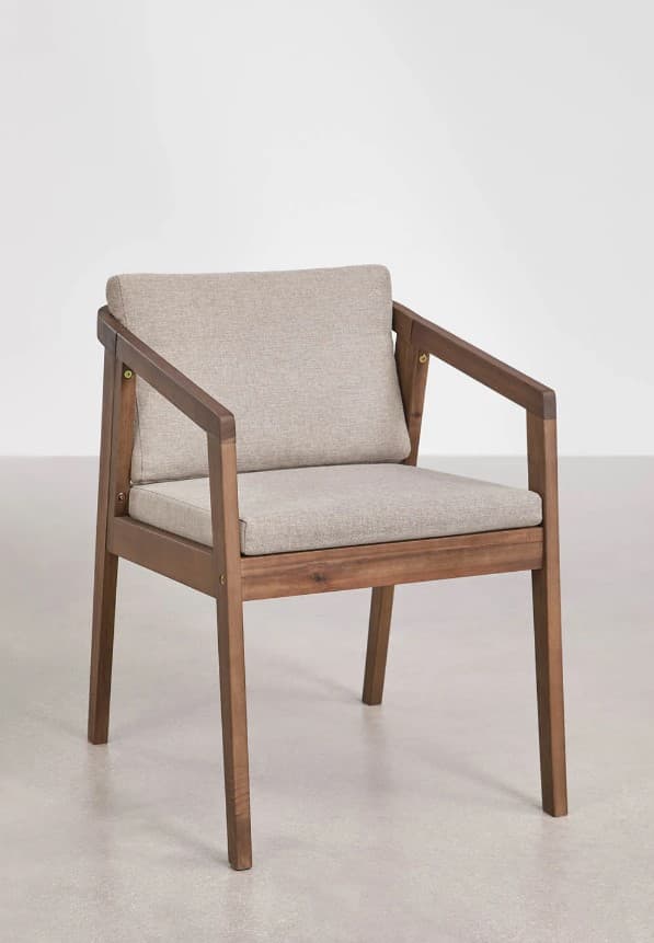 A modern armchair with a wooden frame and upholstered cushions for the seat and back. The frame has a minimalist design with straight lines and visible joinery. The upholstery is a textured fabric in a neutral tone. — 3D model
