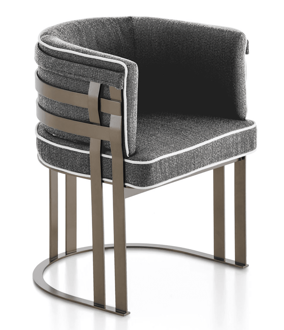 A modern armchair with a curved backrest and seat, upholstered in a textured dark grey fabric with white piping. The armchair features a metal frame with a brushed bronze finish, consisting of a U-shaped base and vertical legs supporting the seat. The backrest is accented with horizontal metal straps. — 3D model