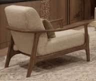 A modern single-seater lounge chair featuring a light-colored upholstered seat and back, supported b… — free OBJ 3D model