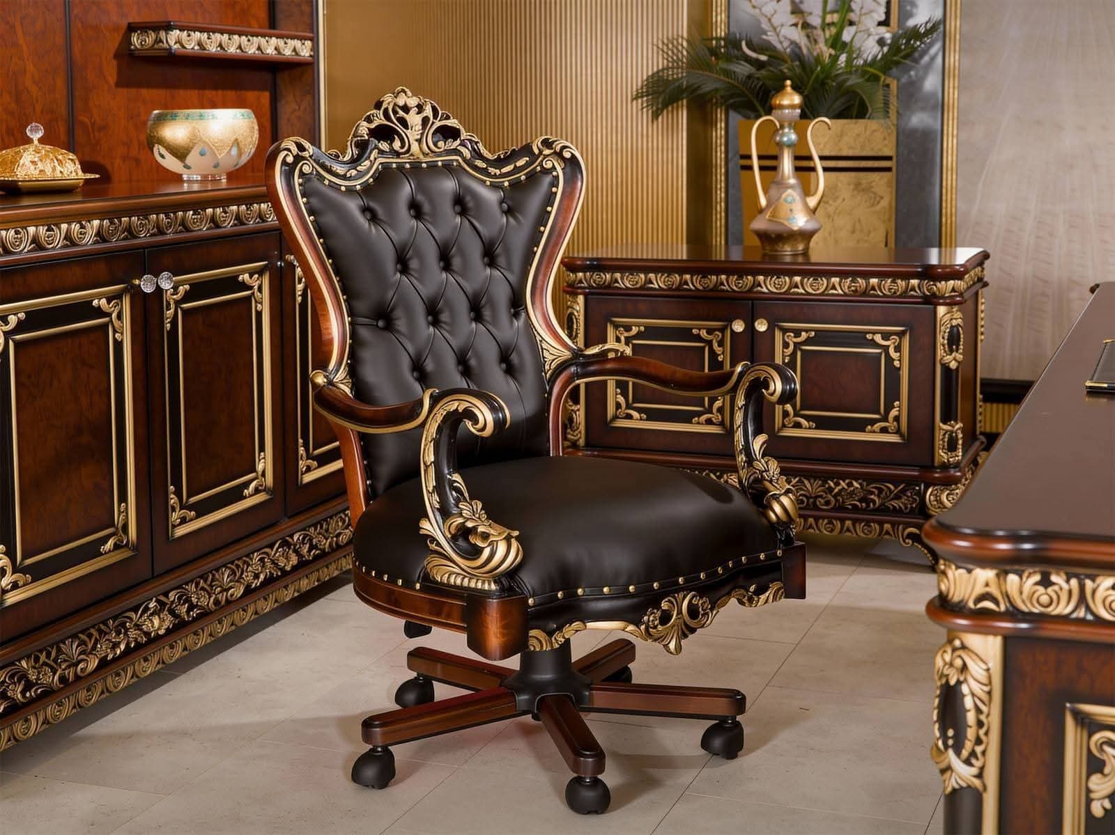 An opulent, high-back executive office chair in a Baroque style, featuring dark brown button-tufted leather upholstery, an intricately carved dark wood frame with extensive gilded gold accents, and a five-star swivel base with casters for mobility. — 3D model