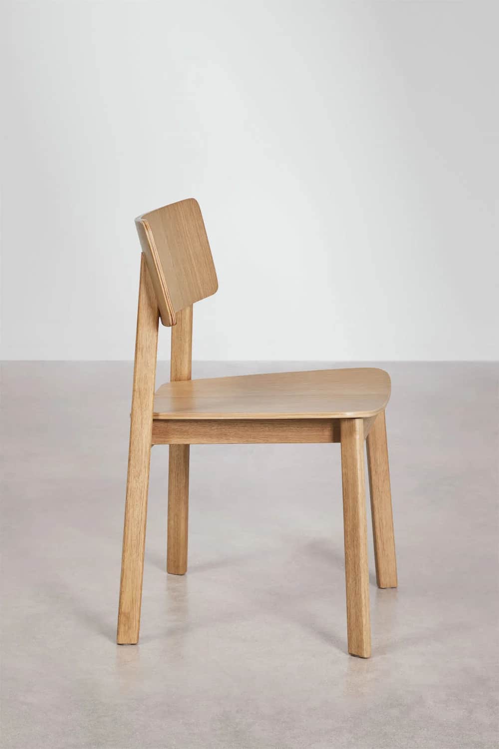 A modern, minimalist side chair constructed from light-colored solid wood, featuring a flat seat and… — 3D model