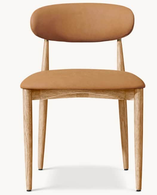 A contemporary dining chair featuring a light oak wood frame and light brown upholstered seat and ba… — 3D model