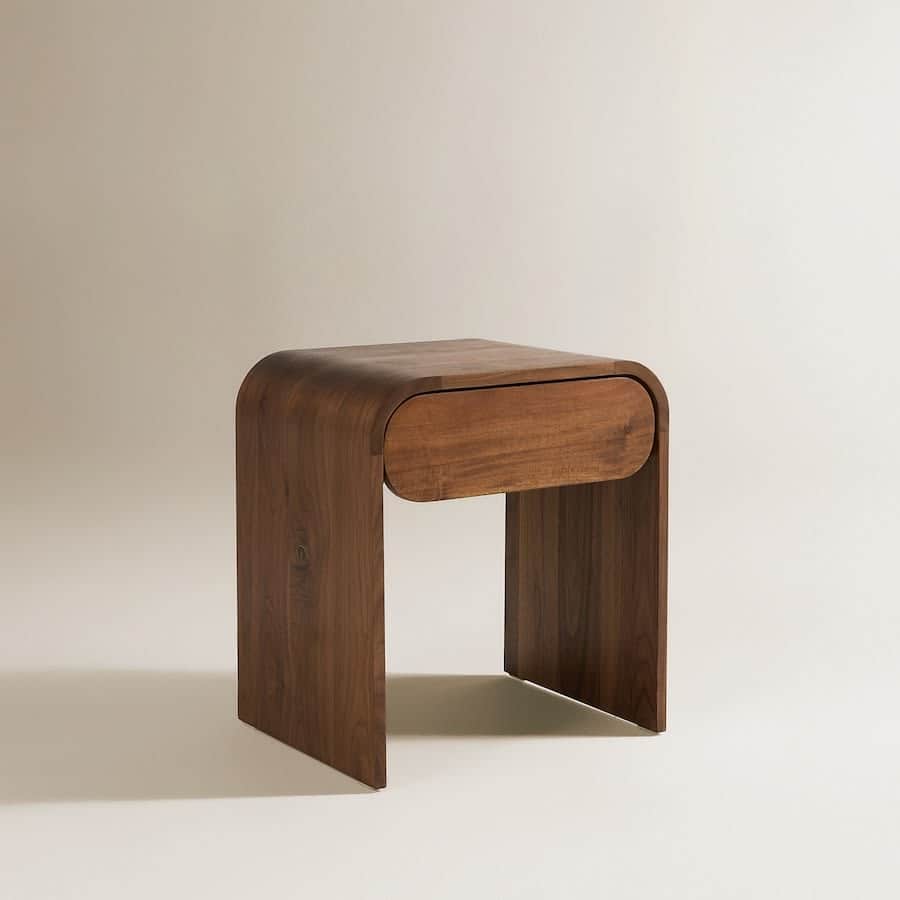 A compact wooden nightstand or side table crafted from bentwood, featuring a continuous curved form… — free OBJ 3D model
