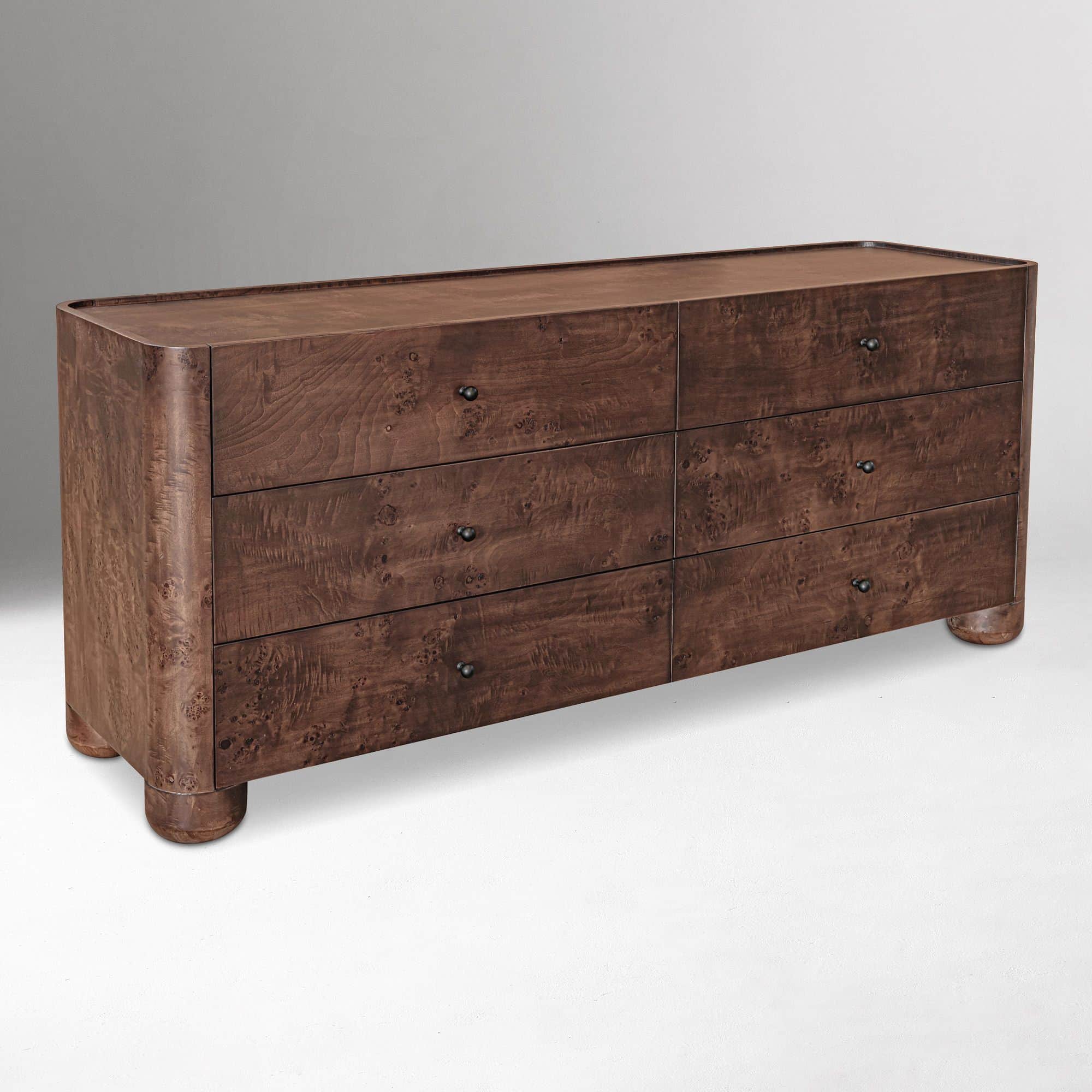 A dresser with a burl wood veneer finish, featuring six drawers arranged in two columns of three. Th… — 3D model