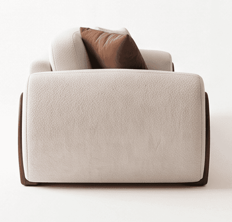 A contemporary upholstered armchair, featuring thick, rounded cushioning in a textured, off-white fa… — 3D model