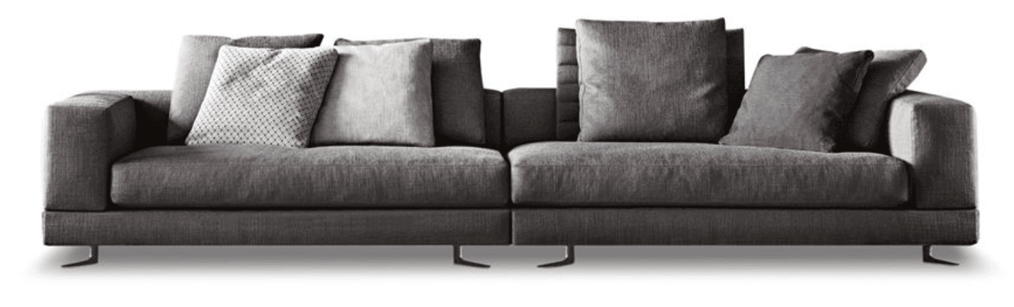 A modern, modular sofa with a charcoal grey fabric upholstery. The sofa features deep seating, plush cushions, and minimalist metal legs. It is configured as a sectional with multiple seating elements. The sofa includes accent pillows, one with a geometric pattern and others in solid grey tones. — 3D model