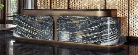 A sophisticated modern reception desk, featuring a substantial body crafted from black and gold vein… — 3D model